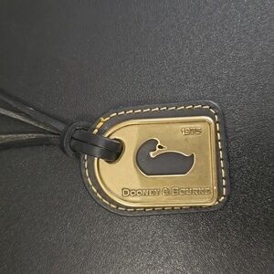 Dooney & Bourke Black and Gold Luggage Tag